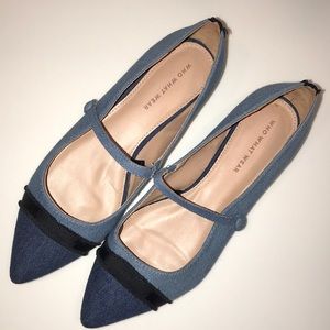 Blue denim-style flats with button snap closure